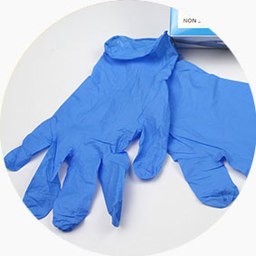 Blue nitrile examination gloves